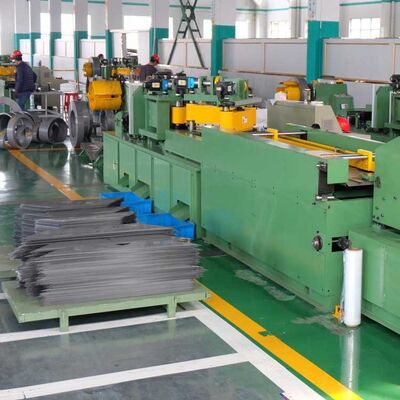 Mesin pemotong inti transformer lebar 300mm dengan pemotongan step-lap dan penumbukan terintegrasi untuk baja silikon